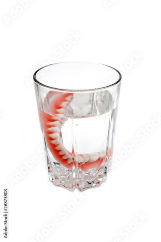 Denture in glass of water before sleeping