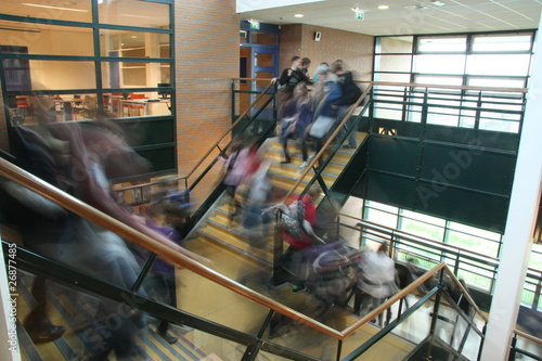 school children moving between classes