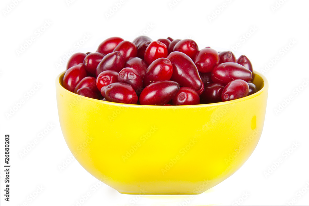 bowl with ripe Cornelian cherries bowl with ripe Cornelian cherries