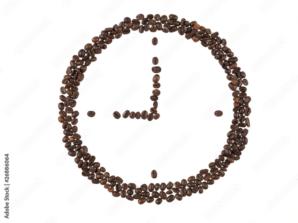 forma di orologio fatta con i chicchi di caffe forma di orologio fatta con i chicchi di caffe