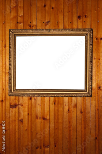 Empty frame over wood wall