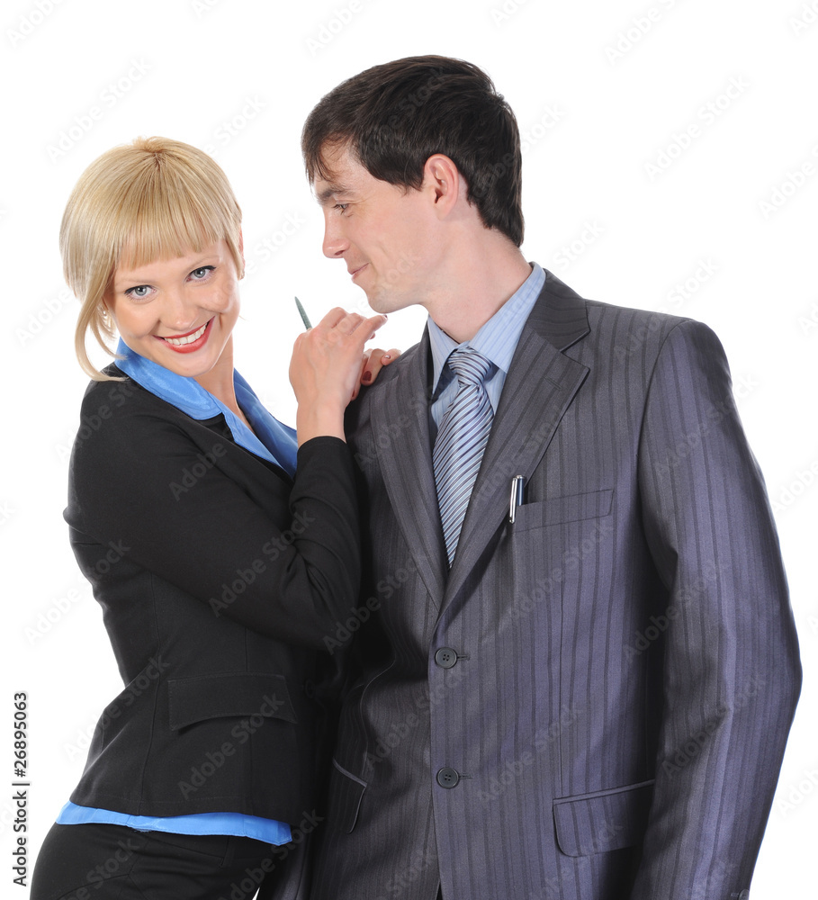 Beautiful blonde woman hugging a man in the suit.