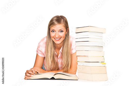 Young adult caucasian woman with books isolated on white © mathom