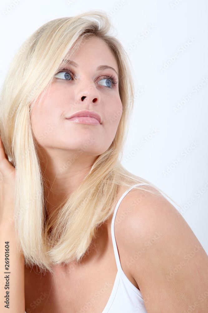 Fototapeta premium Beautiful blond woman on white background