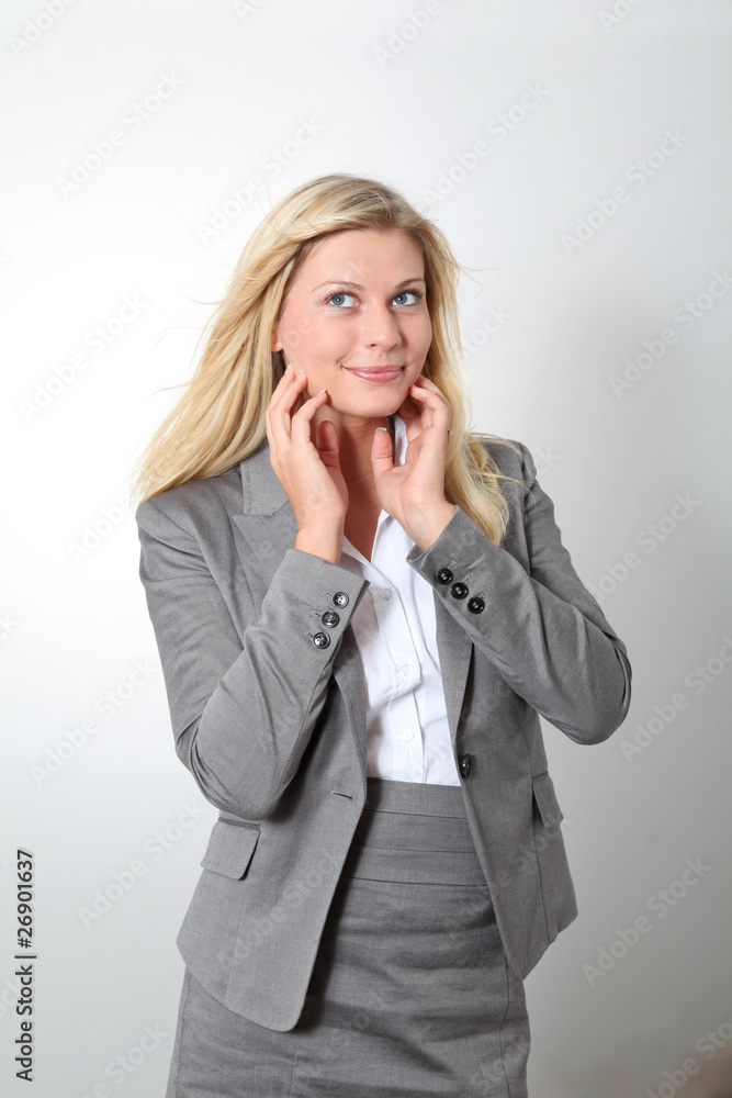 Blond businesswoman doing expressions on white background Blond businesswoman doing expressions on white background