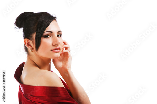 Charming young woman in red gown