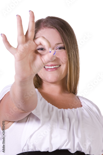 Beautiful Girl Giving the OK Sign © Mehmet Dilsiz