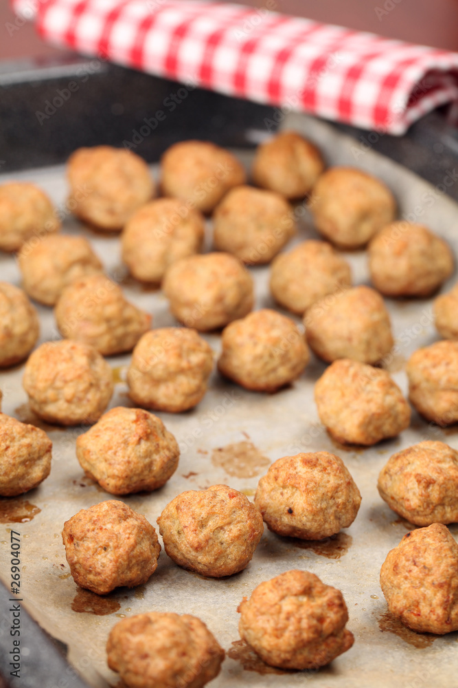 Roast meatballs on baking sheet. Shallow DOF Roast meatballs on baking sheet. Shallow DOF