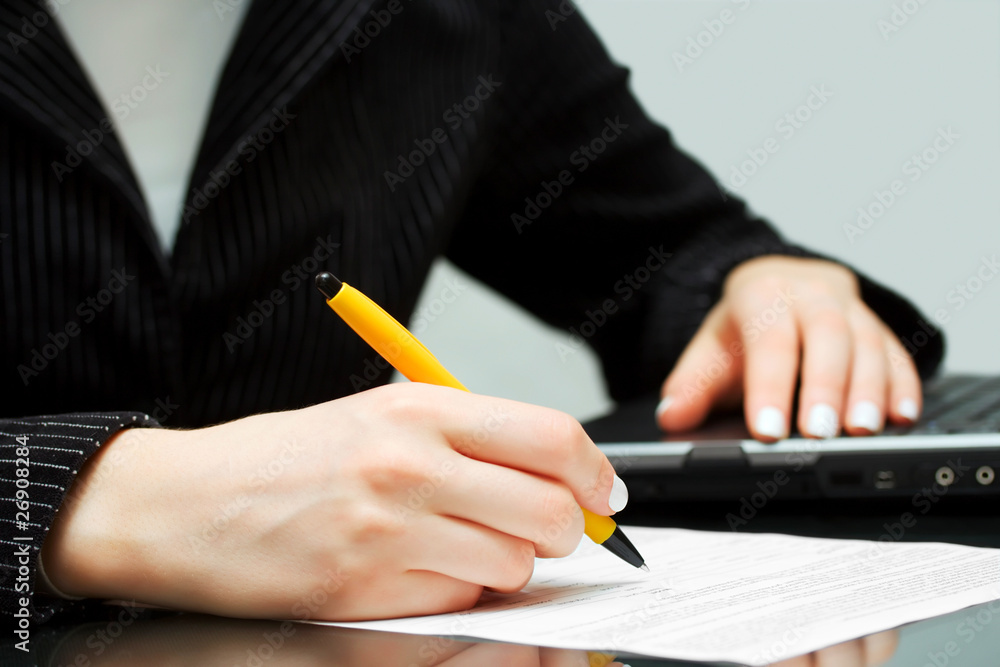 Signing the contract. Signing the contract.