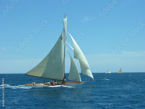 classic yacht sailboat sailing in regatta