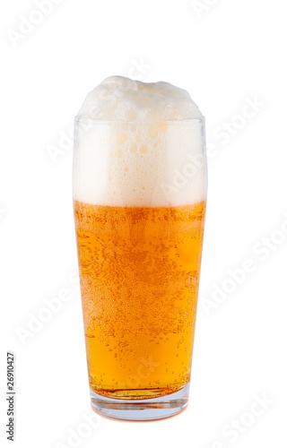 Light beer in glass isolated on white background. Clipping path.