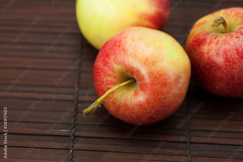 Apples on a bamboo mat