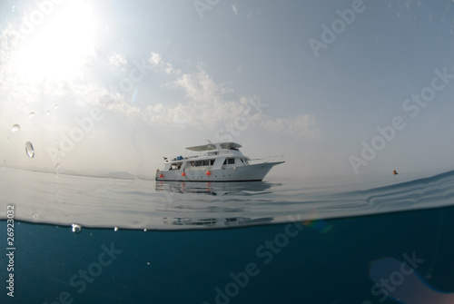 Fish eye view of a motor boat on a calm ocean