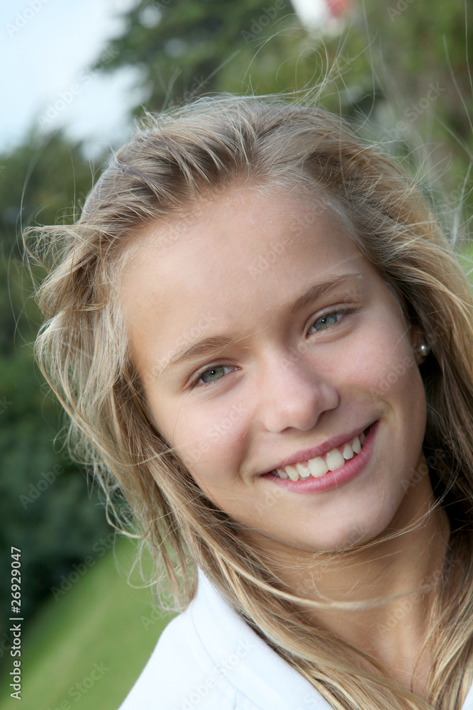 Closeup of smiling blond girl