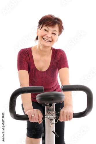 Spinning senior woman