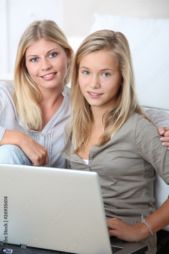 Woman and child surfing on internet Woman and child surfing on internet
