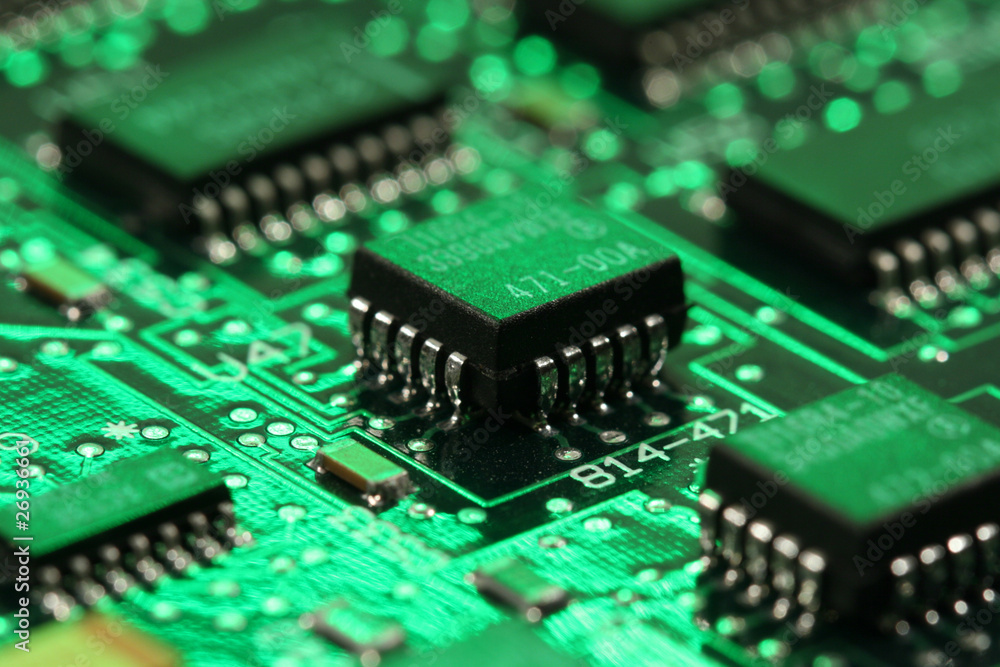 green lit computer mainboard with micro processor green lit computer mainboard with micro processor
