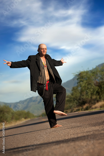 Indigenous man in the middle of a road