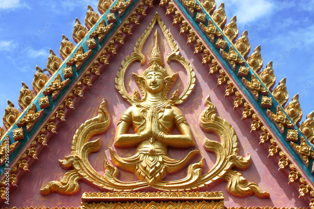 Buddhist art on gable of archway at Wat Kok Lam, Borabue