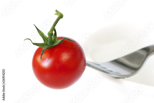 Tomato and Fork on Bowl