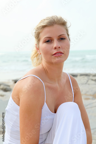 Wallpaper Mural Closeup of beautiful blond woman relaxing by the beach Torontodigital.ca