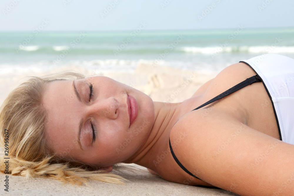Closeup of beautiful blond woman in swimsuit Closeup of beautiful blond woman in swimsuit