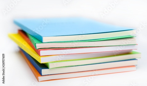 the stack of the coloured books