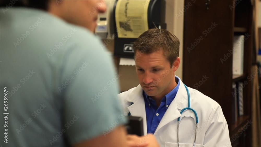 Doctors at Work Talking and Laughing Doctors at Work Talking and Laughing
