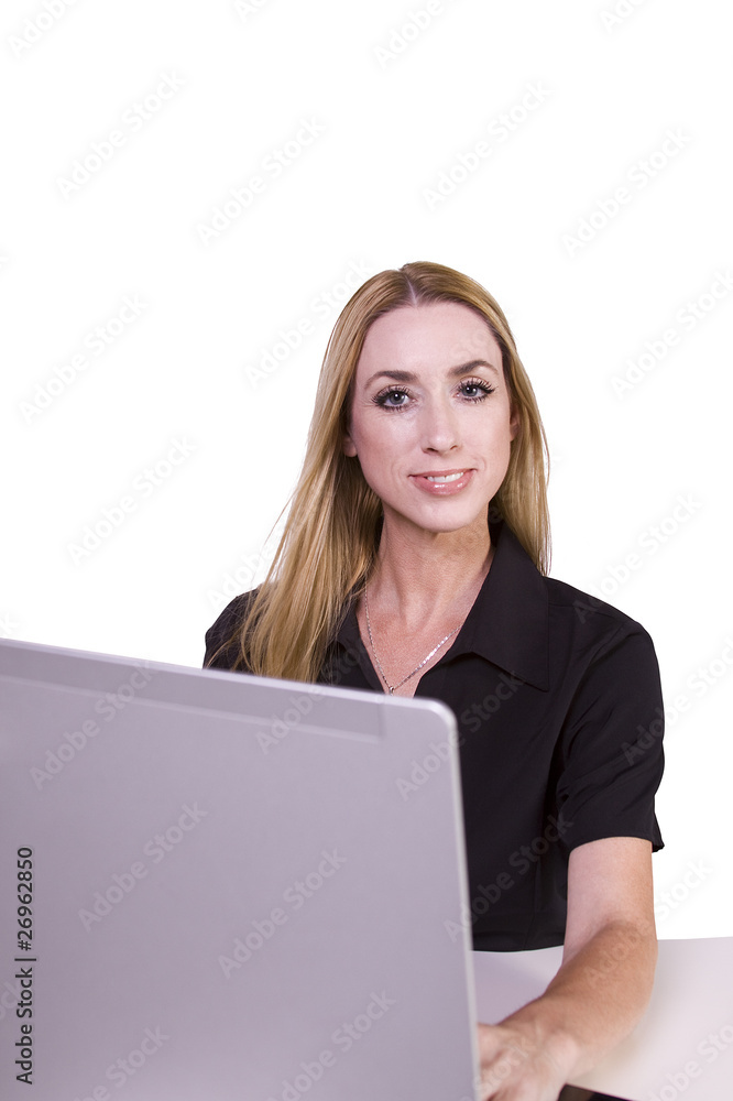 Businesswoman working on her laptop in the Office Businesswoman working on her laptop in the Office