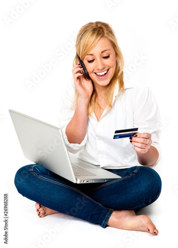 Shopping with laptop, mobile and credit card