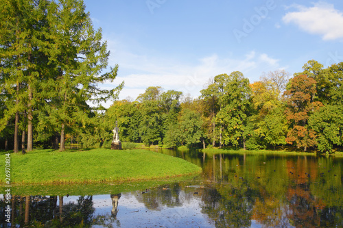 Autumn park with pond