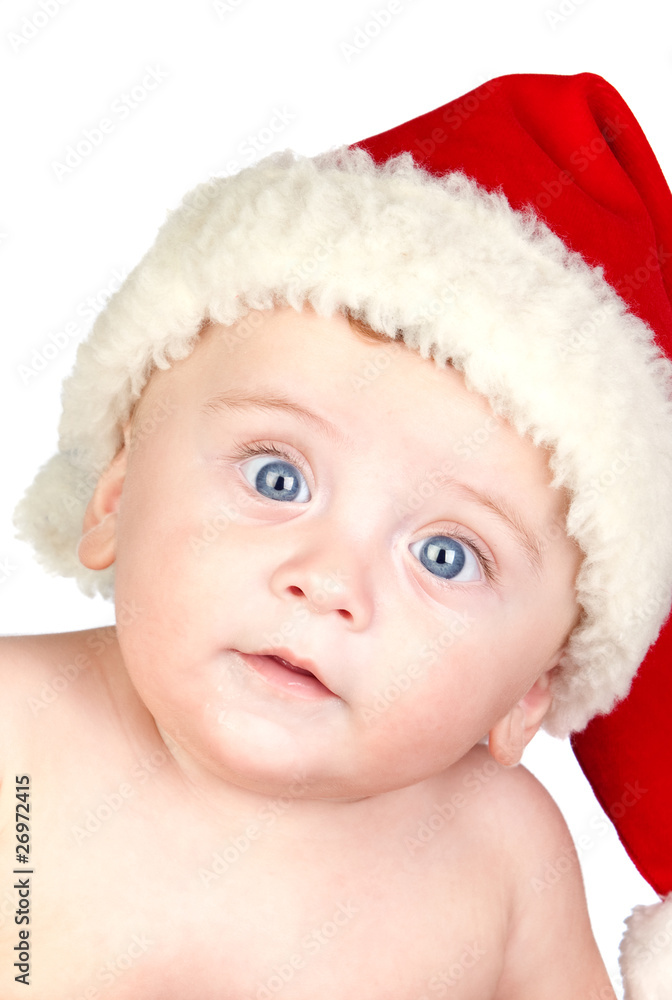 Beautiful babe with blue eyes and Christmas hat Beautiful babe with blue eyes and Christmas hat