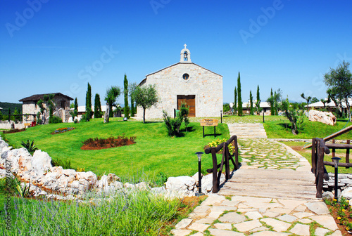 Stone church and houses in Medjugorje, Bosnia