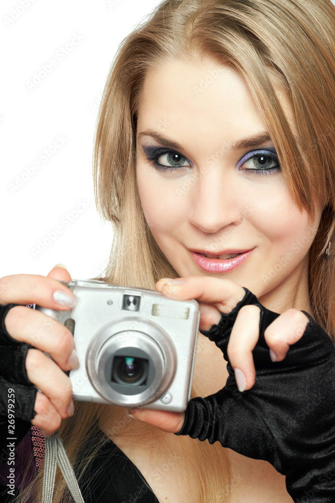 Smiling beautiful woman holding a photo camera Smiling beautiful woman holding a photo camera