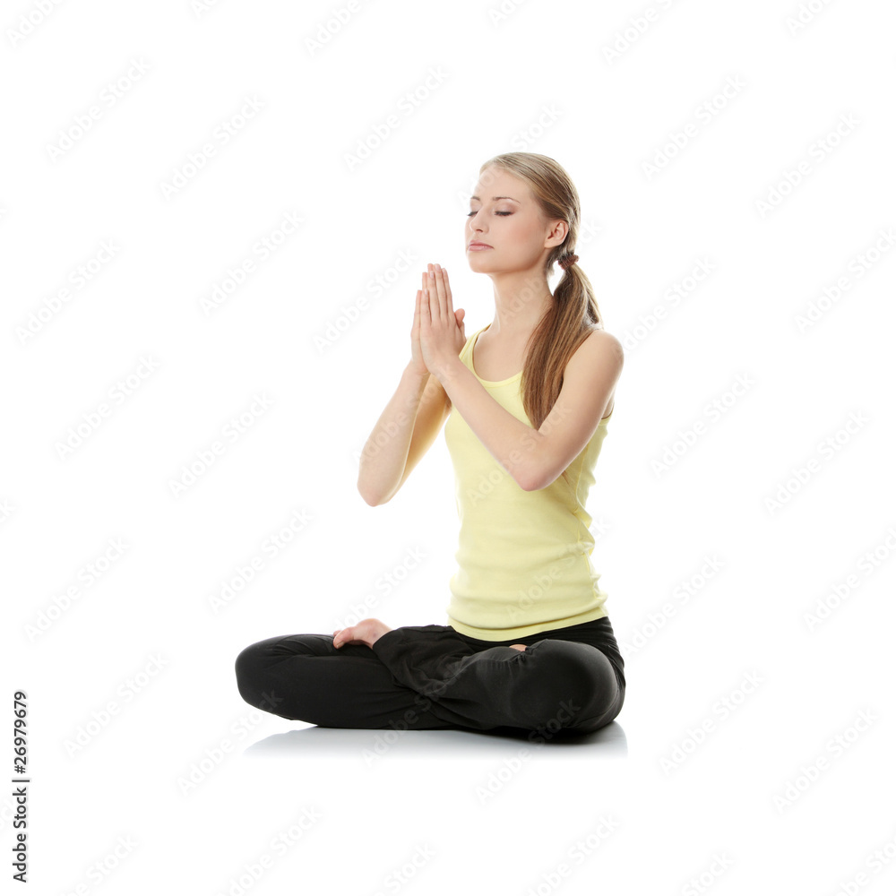 © Piotr Marcinski - Young woman doing exercise © Piotr Marcinski - Young woman doing exercise