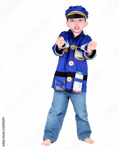 Young boy in police costume