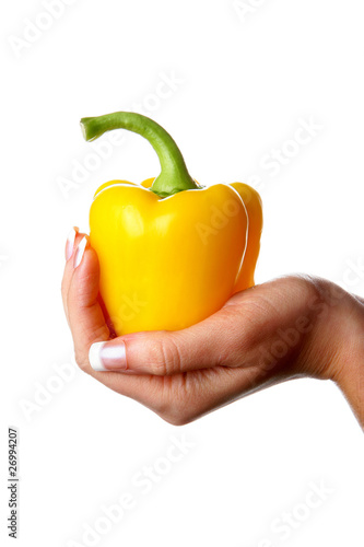 Woman Holding a Yellow Pepper. Model Released