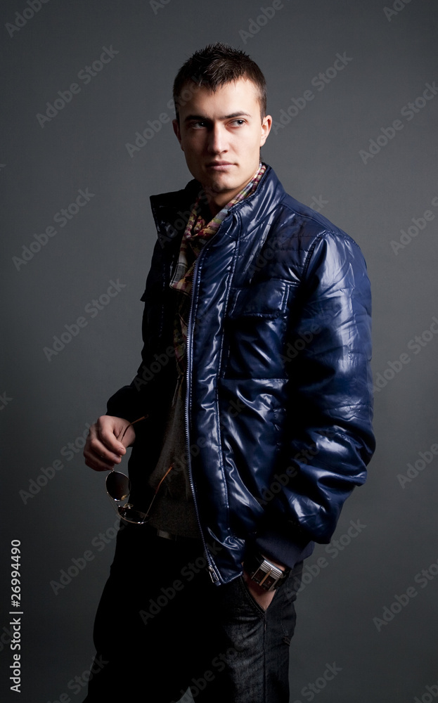 Fototapeta premium handsome young male model posing in studio