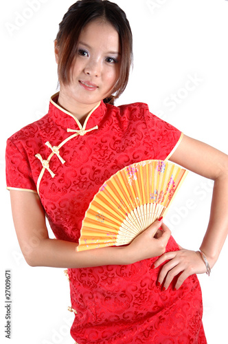 Chinese girl in traditonal dress with fan