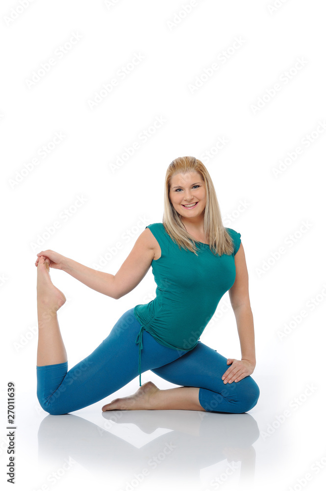 Beautiful happy woman doing pilates pose. isolated on white back