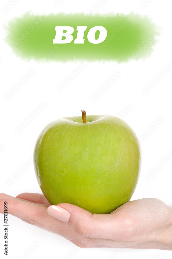 Green apple in a beautiful hand of woman with perfect nail manic Green apple in a beautiful hand of woman with perfect nail manic