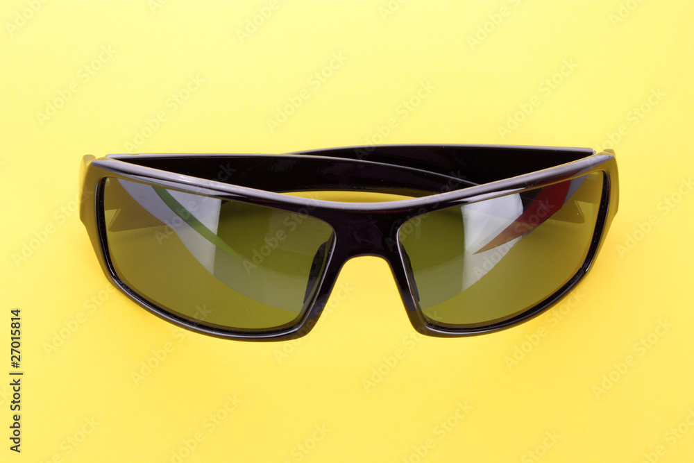 Sunglasses over yellow Sunglasses over yellow