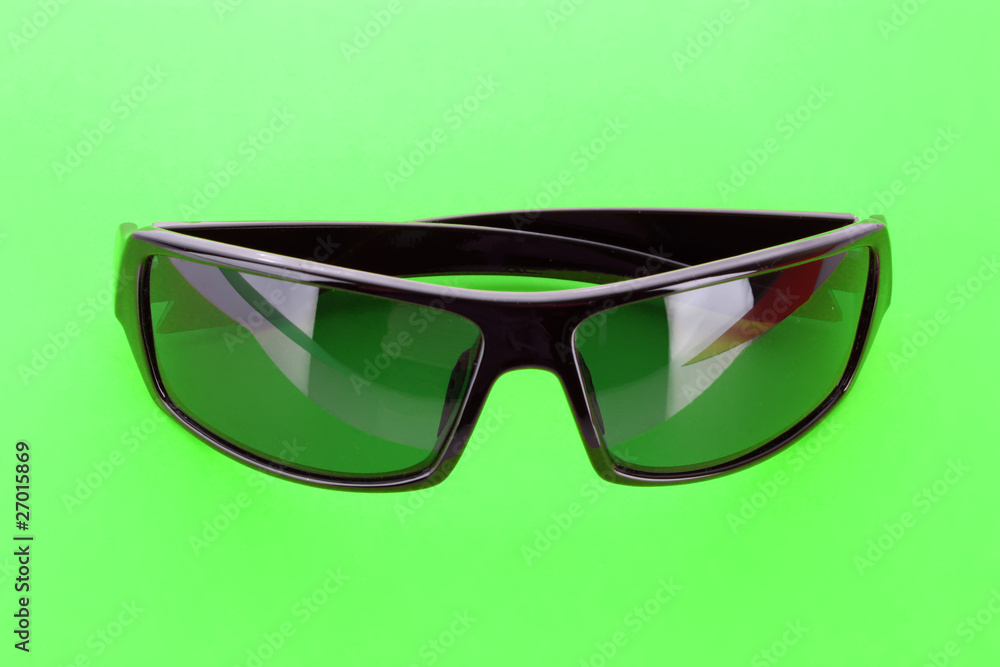 Sunglasses over green Sunglasses over green