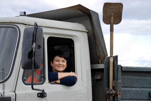 the woman behind the wheel of a truck