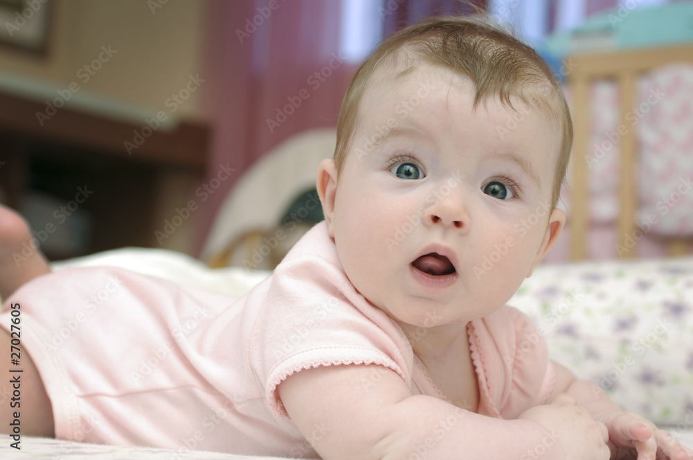 Closeup portrait of adorable baby girl looking at camera Closeup portrait of adorable baby girl looking at camera