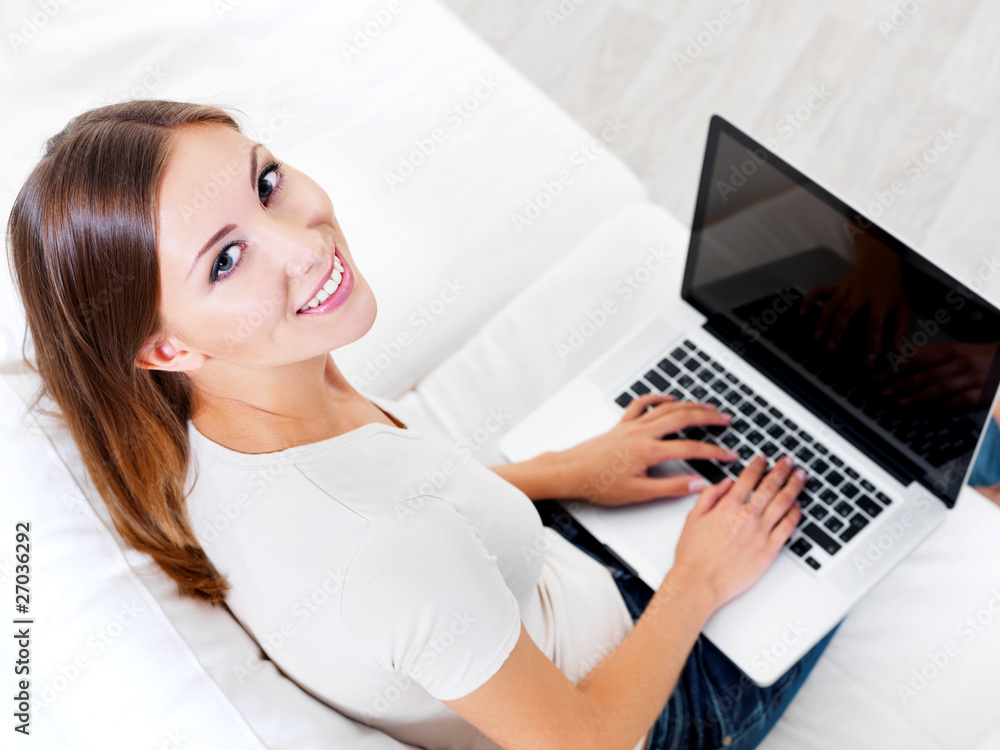 young beautiful woman with laptop at home young beautiful woman with laptop at home