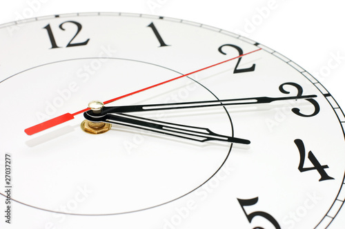 white clock showing time about nine isolated
