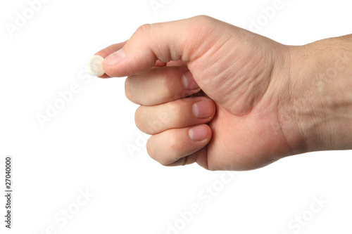 man's hand holds a tablet