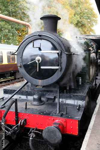 Steam Locomotive standing in station photo