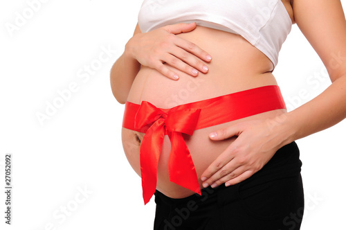 Abdomen a young pregnant woman © Sergey Nivens